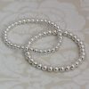 4mm silver ball beads threaded on elastic bracelet