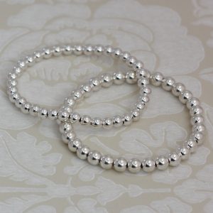 4mm silver ball beads threaded on elastic bracelet