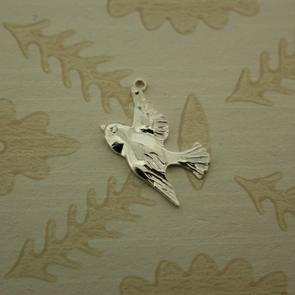 large silver bird charm