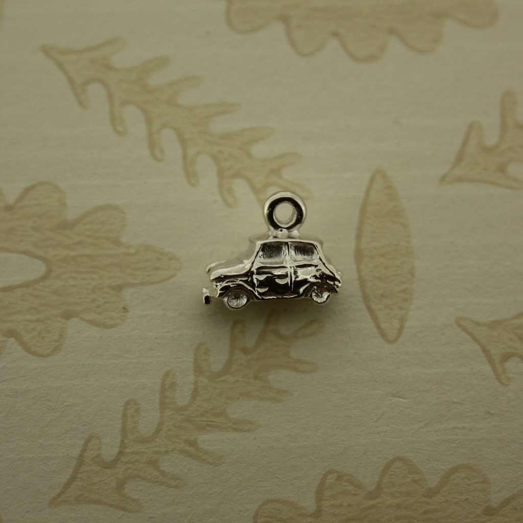 silver car charm