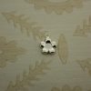 small silver flower charm