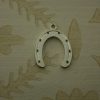 large silver horseshoe charm