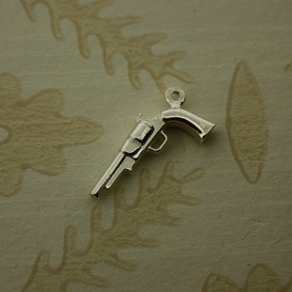 silver pistol charm