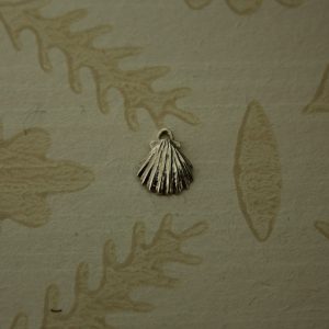 tiny silver scallop charm