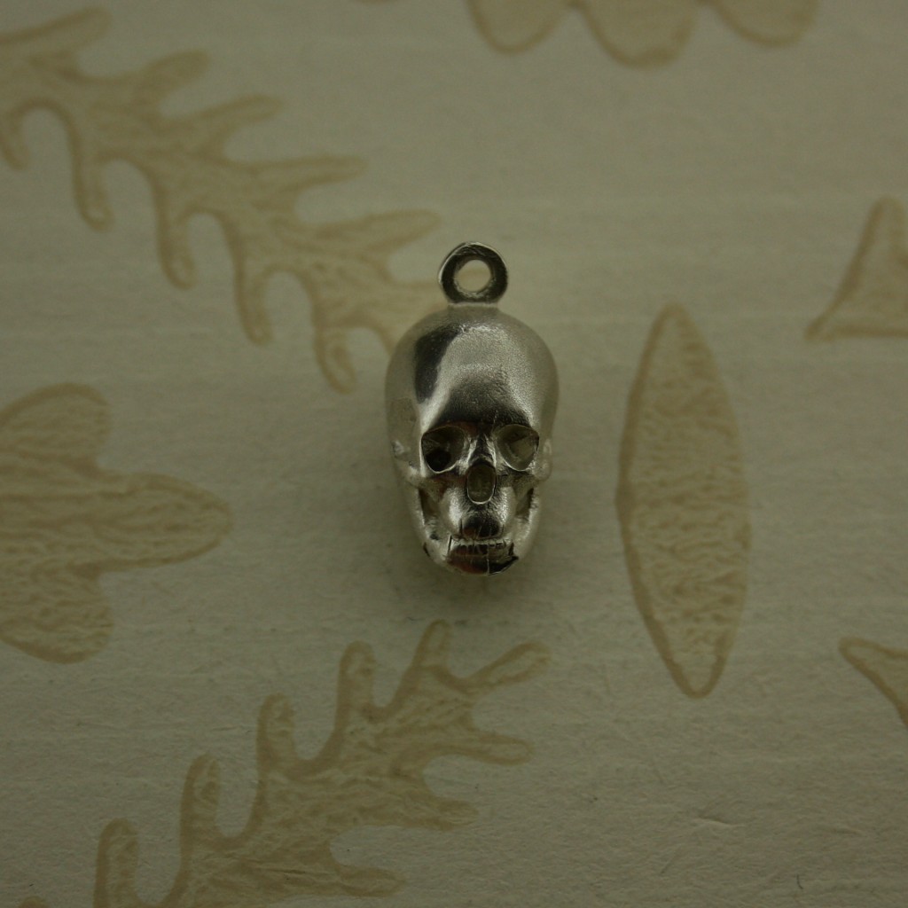 silver skull charm
