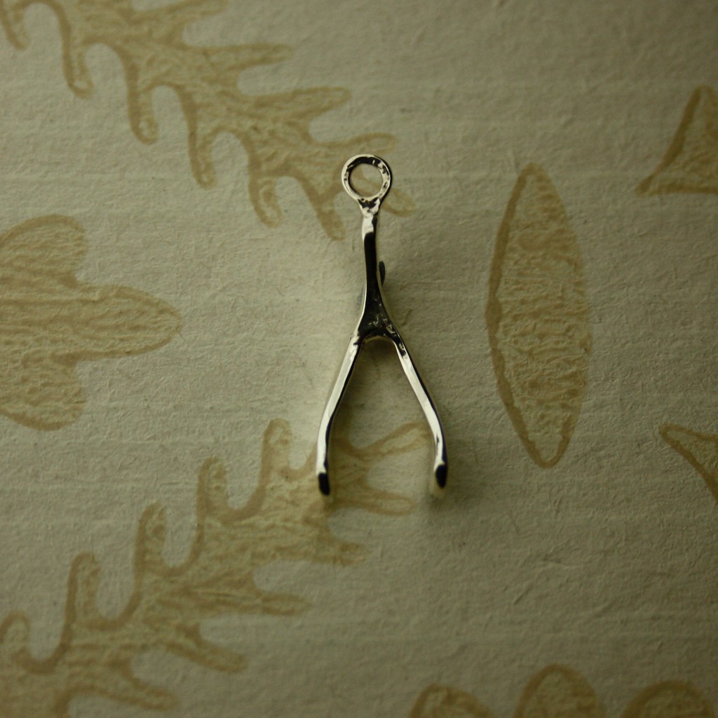 silver wishbone charm 2cm by 0.7cm