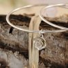 silver rose charm on a 2mm wire bangle