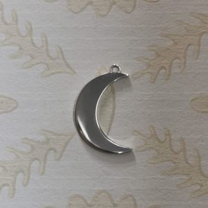 Silver crescent moon charm