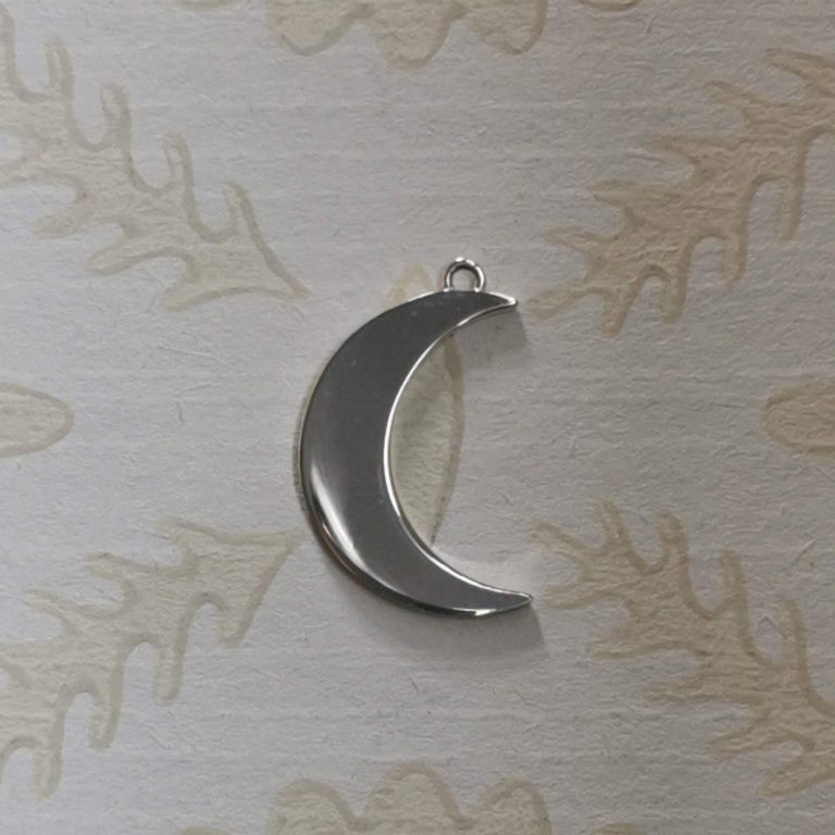 Silver crescent moon charm