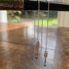 silver arrow charms on threader chain earrings